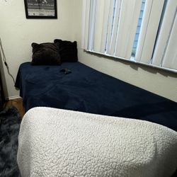 Twin size bed with frame.