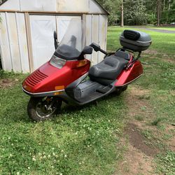 93 Honda Helix CN 250 and Chariot Motorcycle Trailer
