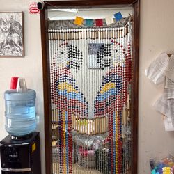 Peruvian parrot door hanging.