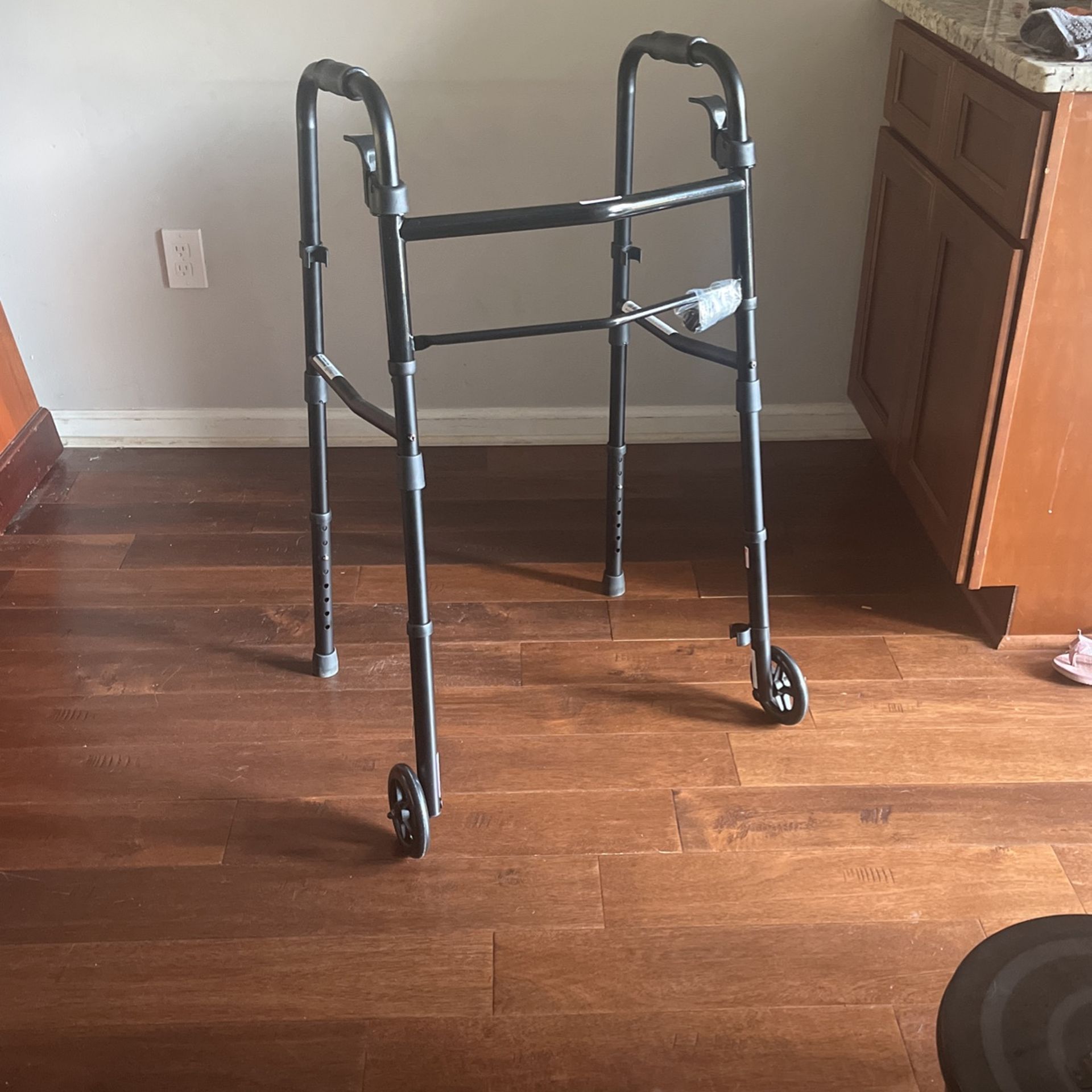 Brand new folding "Travel Walker"