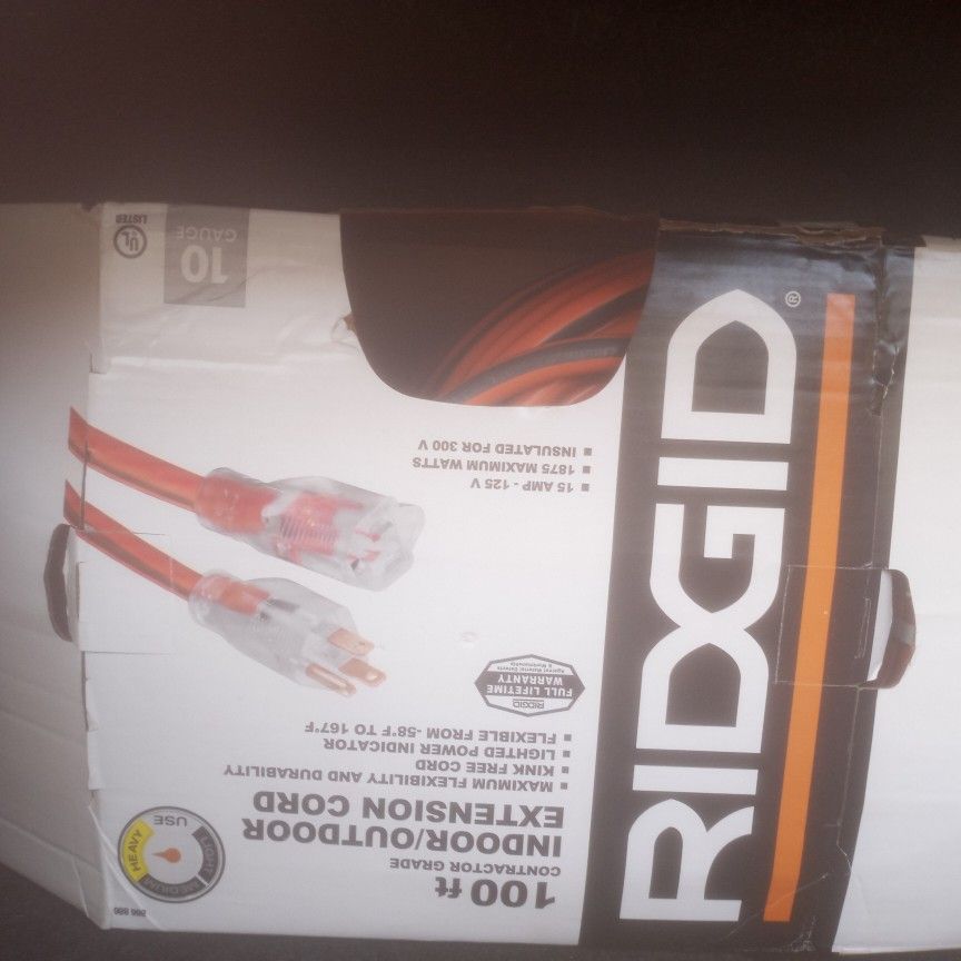 Never used indoor/outdoor Extension cord 100ft