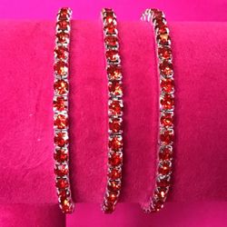 Three Red Rhinestone Bracelets