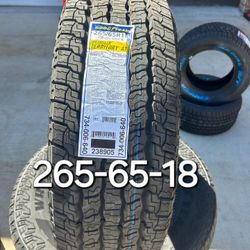 2656518 Goodyear Wrangler A/T Tires with free Install mount & balance 265-65-18
