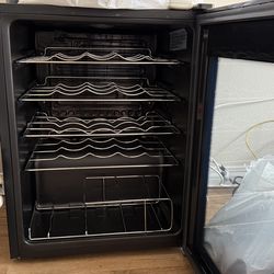 Appliances, stereos, coffee maker, wine refrigerator