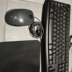 Logitech keyboard and mouse with pad