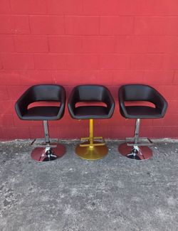 Set of 3 beautiful contemporary low-back counter stools that adjust up to bar height,  $140 for all 3 stools