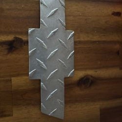 Chevy GRILL PLATE- Steel Cut (7”)- Not Avail.