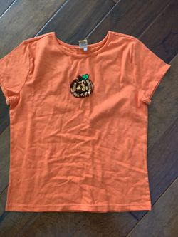 Super cute orange slot short sleeve pumpkin shirt size 14/16 never worn with tags