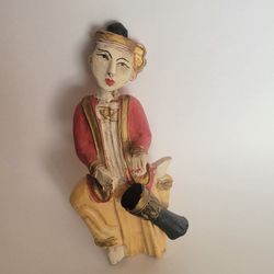 Vintage 9.5"in. Hand Carved Thai Wooden Musician Wall Hanging Made 
Thailand Red. Pre-owned, very good shape, no chips or cracks. Display 
item. Pleas