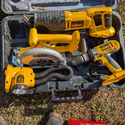 DeWalt four-piece cordless kit.   Works fine. Just don't have no battery $150.