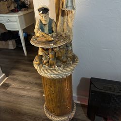 This is a vintage Apsit Bros. of California nautical lamp sculpture featuring a sea captain or fisherman figure.  