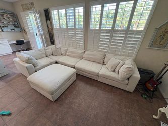 Large Cream Modular Sectional Sofa with Ottoman