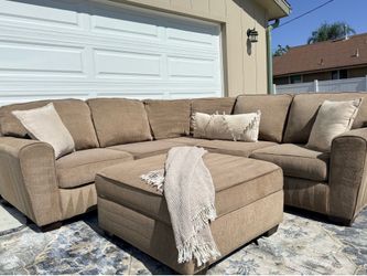Living spaces beige sectional w ottoman DELIVERY AVAILABLE