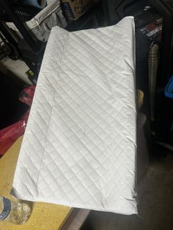 Changing  Table Pad 
