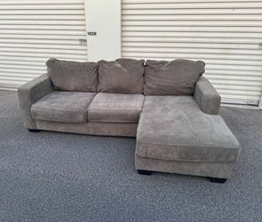Gray Ashleys Furniture Sectional with Reversible Chaise(WILL DELIVER)