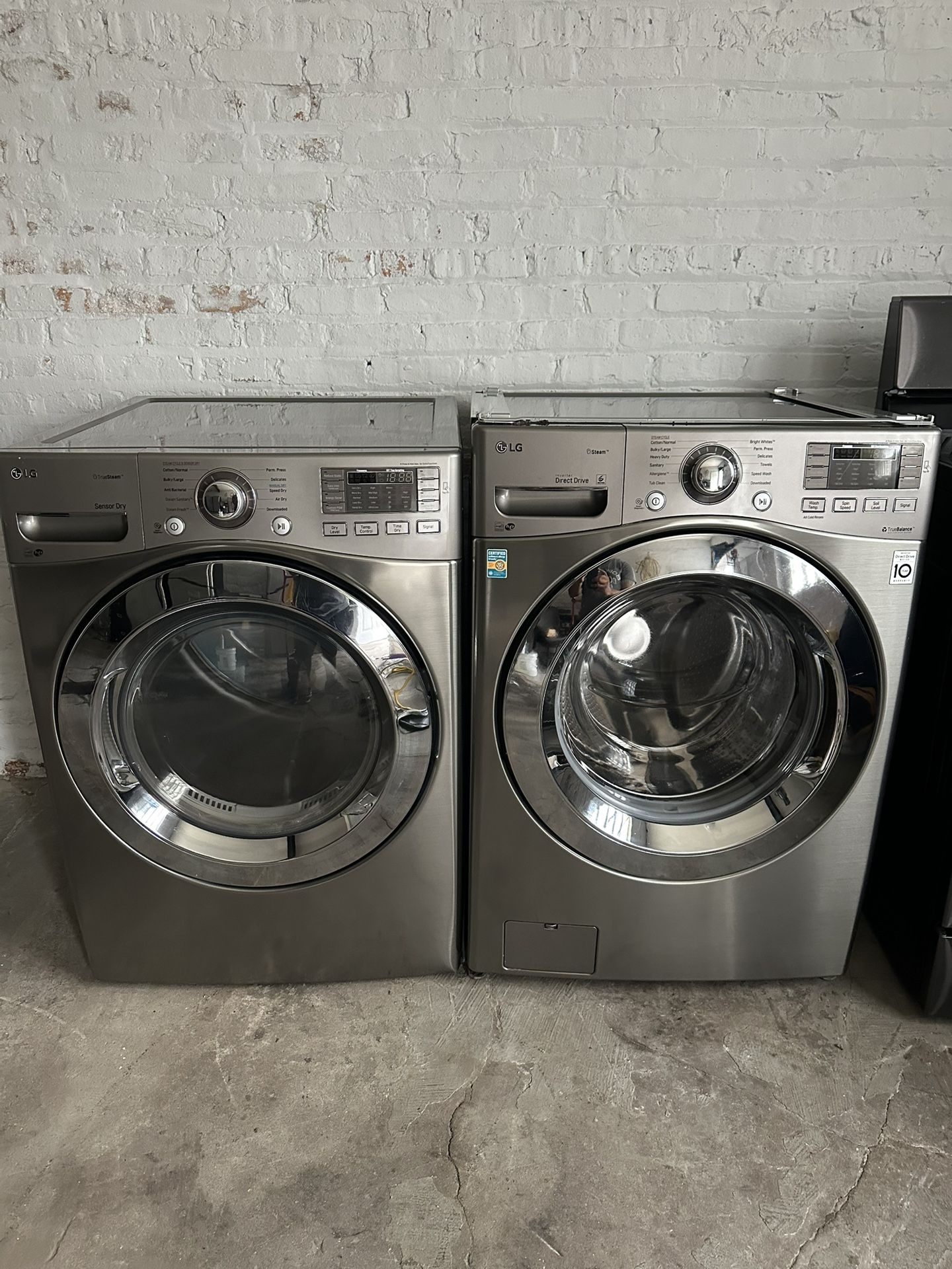 LG front load washer &. LG front load gas dryer set stainless steel 27”