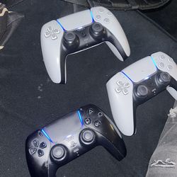 Three PS5 controllers