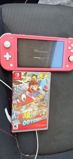 Nintendo switch lite with super Mario odyssey