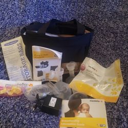 Medela Breast Pump With Extras 