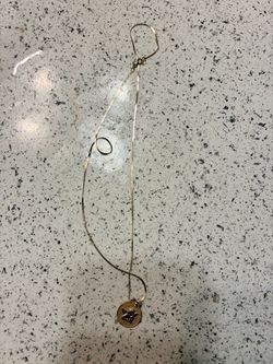 14k herringbone chain with 10k angel pendant