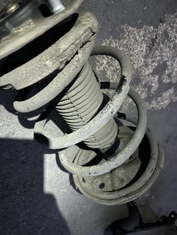 2003  Lexus ES300 Strut and front passenger side spindle knuckle