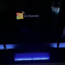 LG 65” TV /FIREPLACE TV STAND 