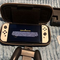 NINTENDO SWITCH OLED WITH MARIO RABBIDS, DOCKING STATION, HDMI, AND JOYCON GRIP
