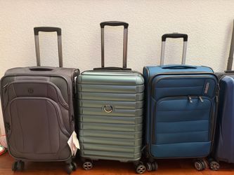 Mixed Lot of 4 Spinner Luggage Suitcases