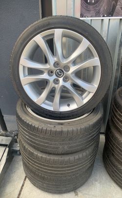 OEM mazda wheels 19" 5 lugs with 4 used tires $550