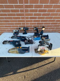 Ryobi 18V ONE+ Cordless Power Tool Set: Drill, Vacuum, Saw, Circular Saw Light sander. Bare tools and one charger. Batteries not included. There are 2