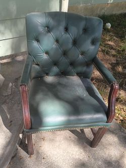 Green chair is comfortable kind of dusty but pretty much is comfortable