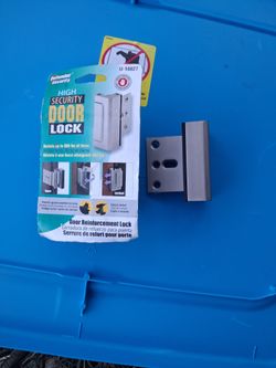 Two high security door locks, one open one new.