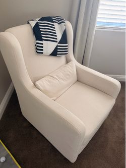 Tan Swivel Recliner