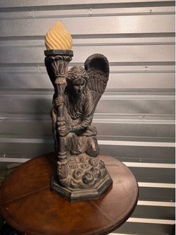 Kneeling  Angel with torch