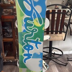 Burton snowboard, Burton bindings, thirty two brand boots with Dakine Bag