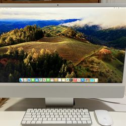 Apple iMac 24inch M1 Chip 8GB/256GB 2021 Model like new condition. Trade for MacBook