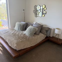 Eastern King Platform Bed With 8 Inch Frame Around It Two Side Tables That Can Be Attached