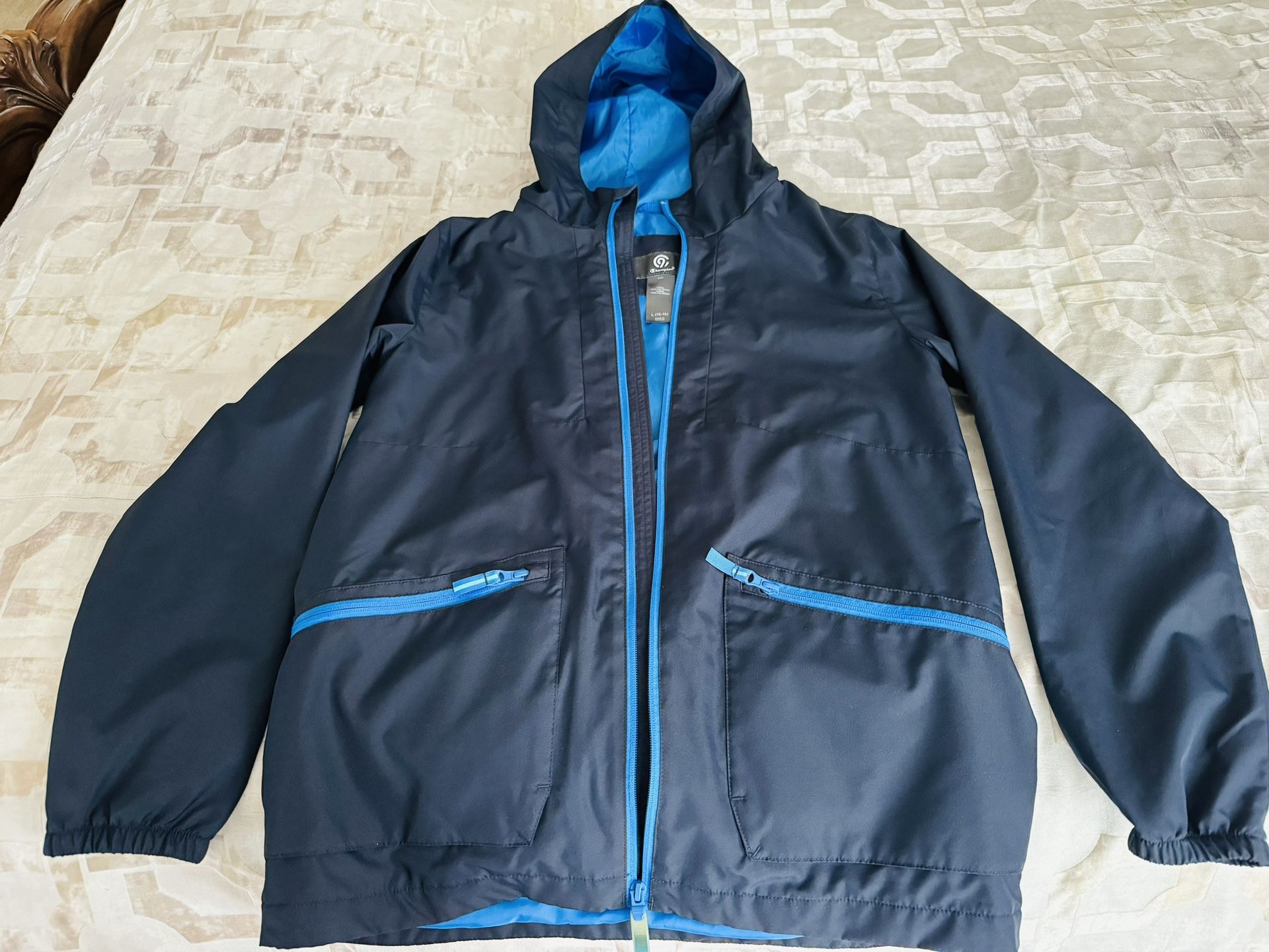 Champion youth rain jacket size L(12-14). Almost new. Used once.