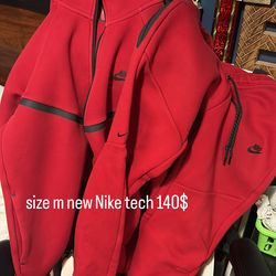 Red men’s Nike tech sweatsuit
