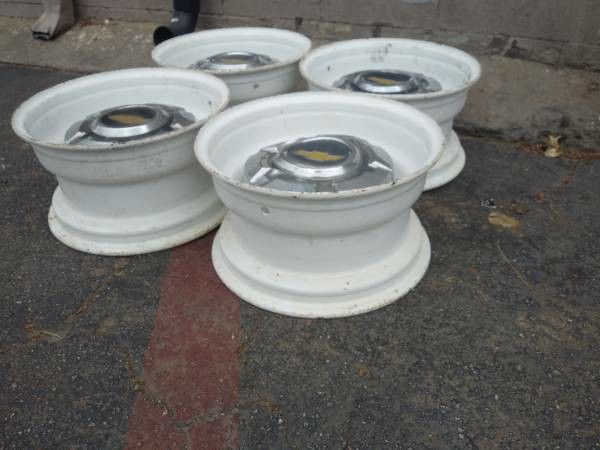 Custom built 15x8 Chevy C10 6 lug steel rims and caps -