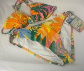 Brand new Juniors tropical print swimwear size L