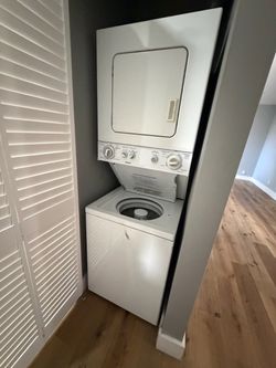 White Stacked Washer Dryer Unit