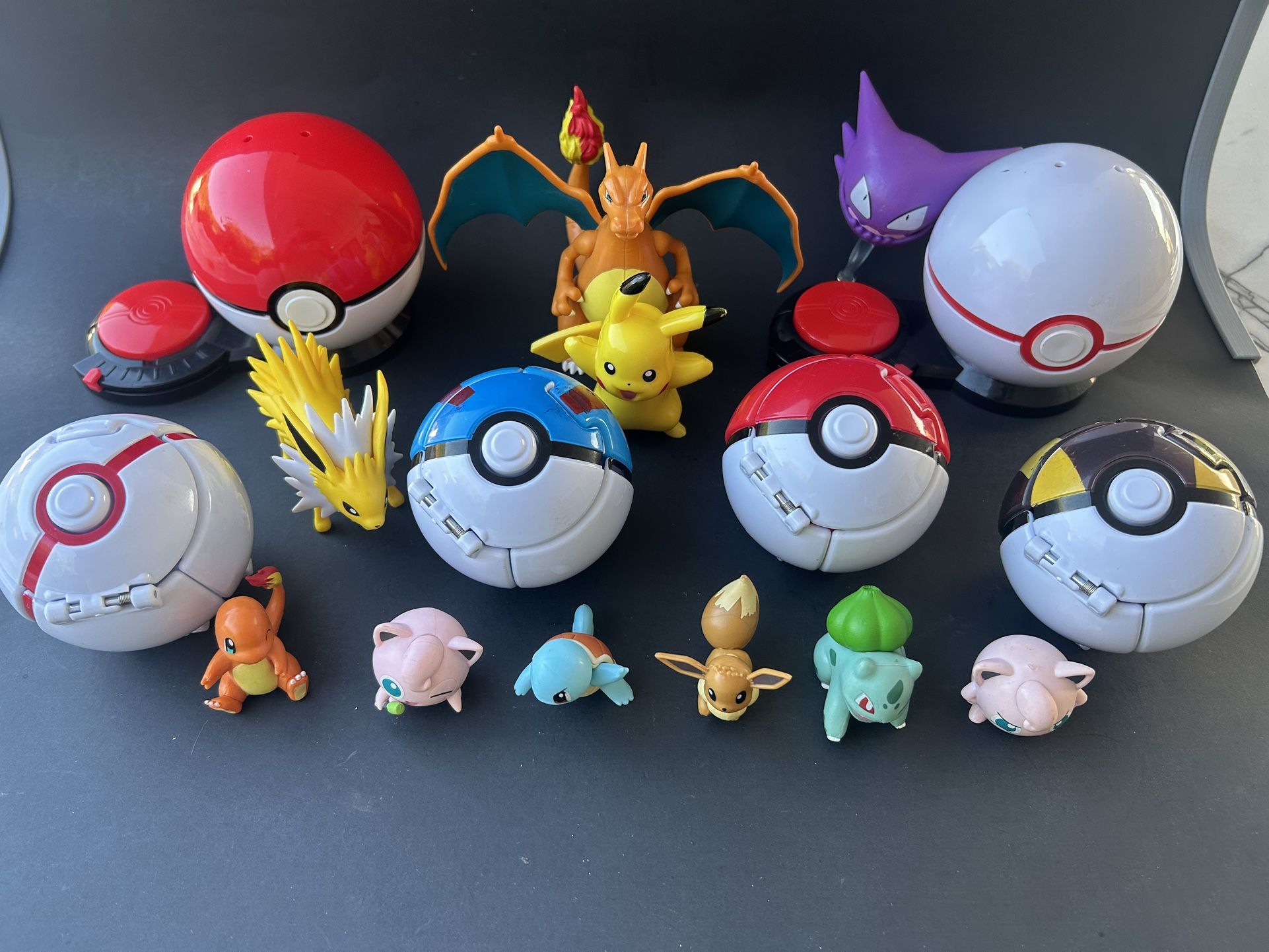Pokemon figures and poke ball toys
