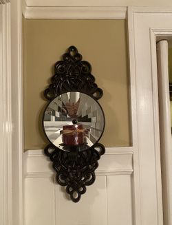 Mounted candle holder