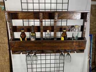 Bottle holder with glass caddie