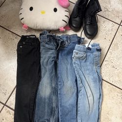 4 pants, 1 pair of size 2 dock martins boots and a backpack