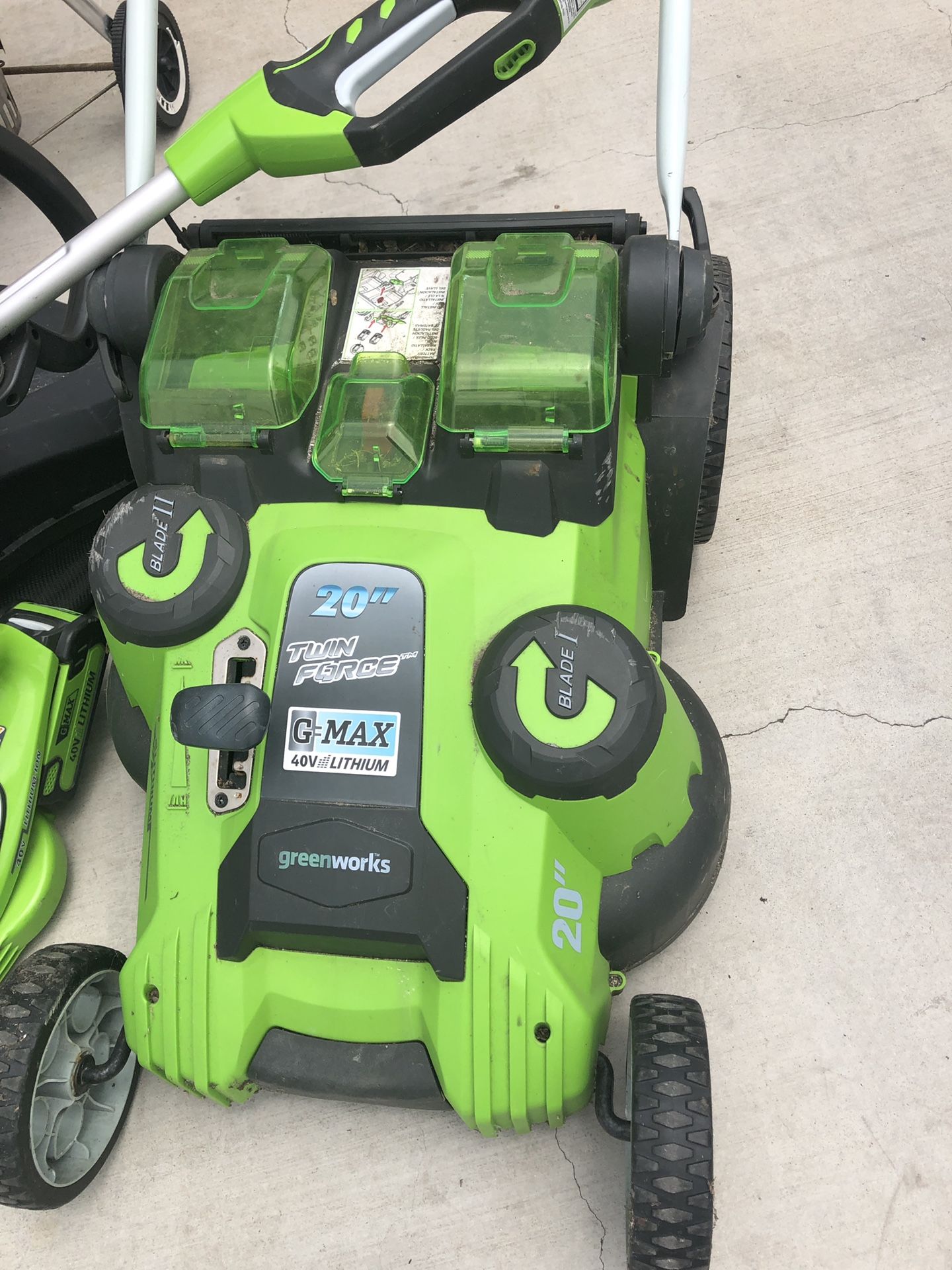 Greenworks electric 3 pieces.charger an 2 batteries. Cord less string trimer, lawn mower and blower.