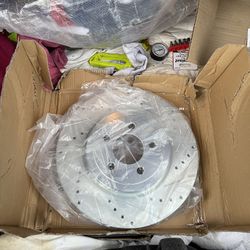 Drilled and slotted rotors and pads