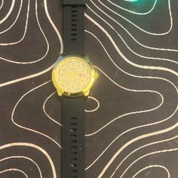 gold-tone EAJOMIN men's wrist watch with a black silicone band