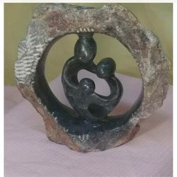 Beautiful Carved Stone Statue of Family Dancing Embracing